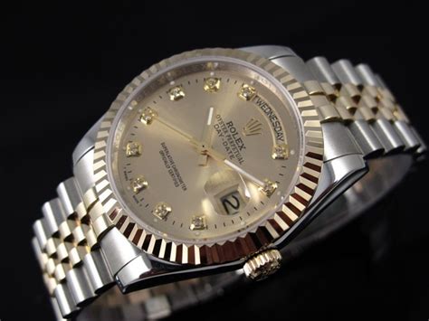 rolex day date stainless.